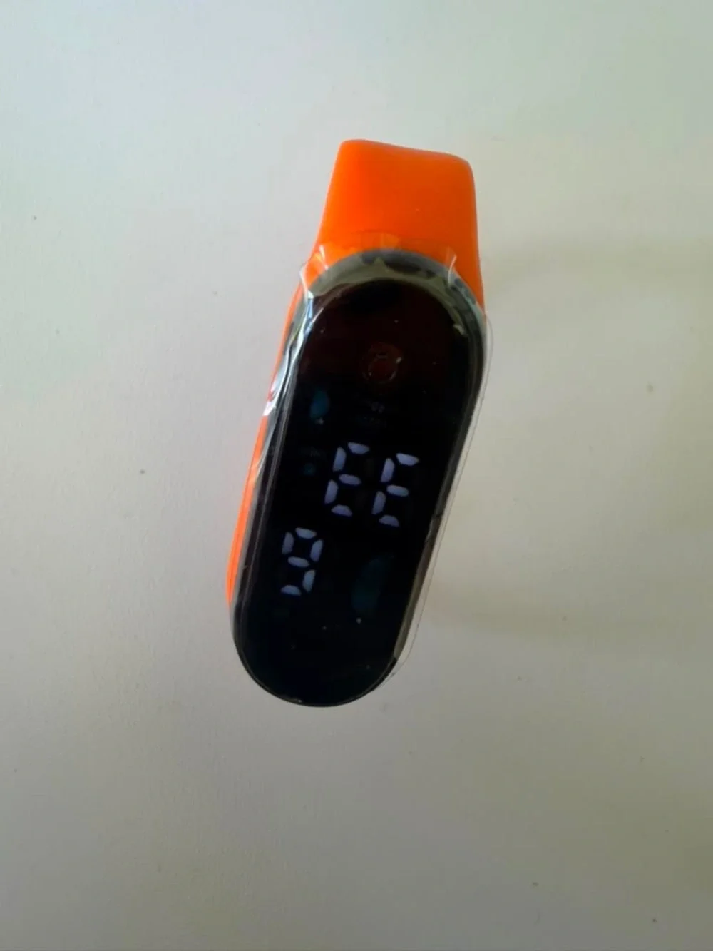 Replaceable Orange Silicone Smartwatch Band with Black Tracker Module